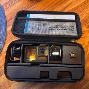 Black Digital Camera with Protective Case and Advanced Features